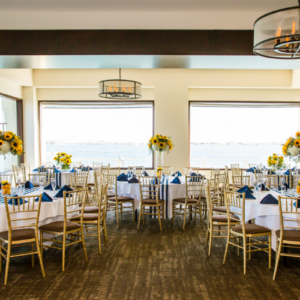 Dining room with ocean view and sunflowers