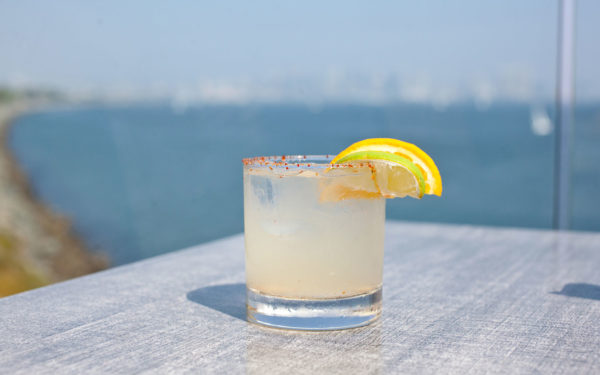 house margarita with a lemon and lime